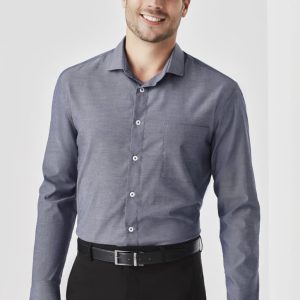 A long sleeve button-up shirt in a navy hue featuring a chest pocket and a brand logo.